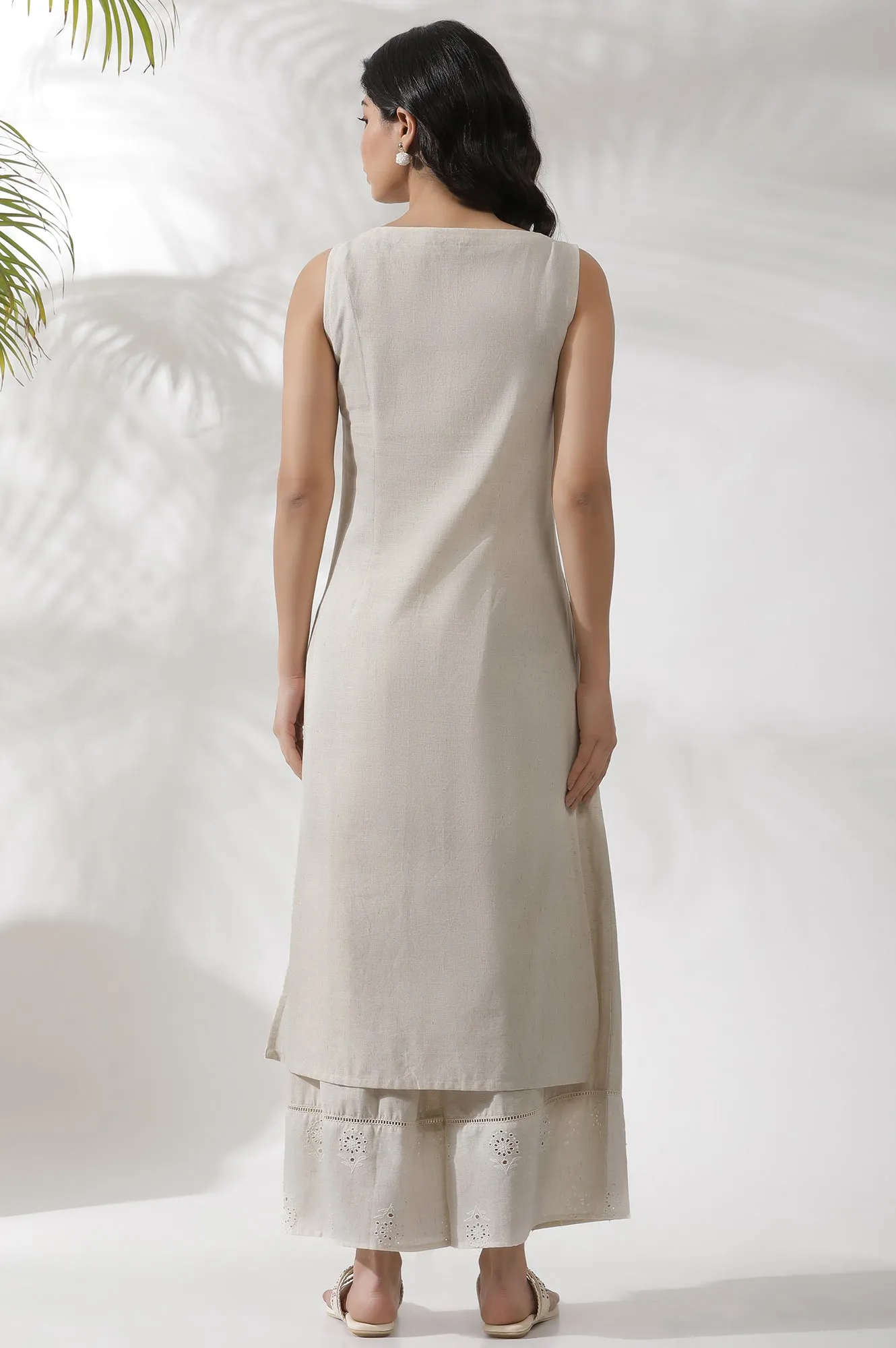 Light Beige Sleeveless Schiffli Kurta And Flared Pants Set