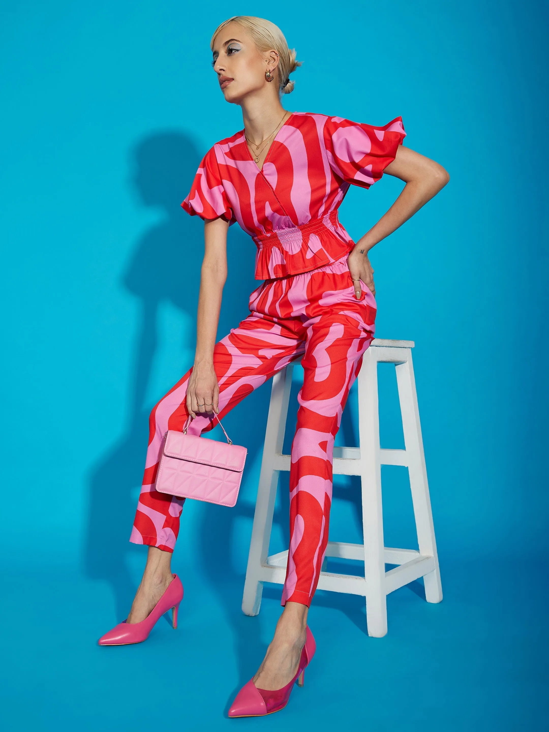 Women Pink Abstract Print Peplum Top With Tapered Pants